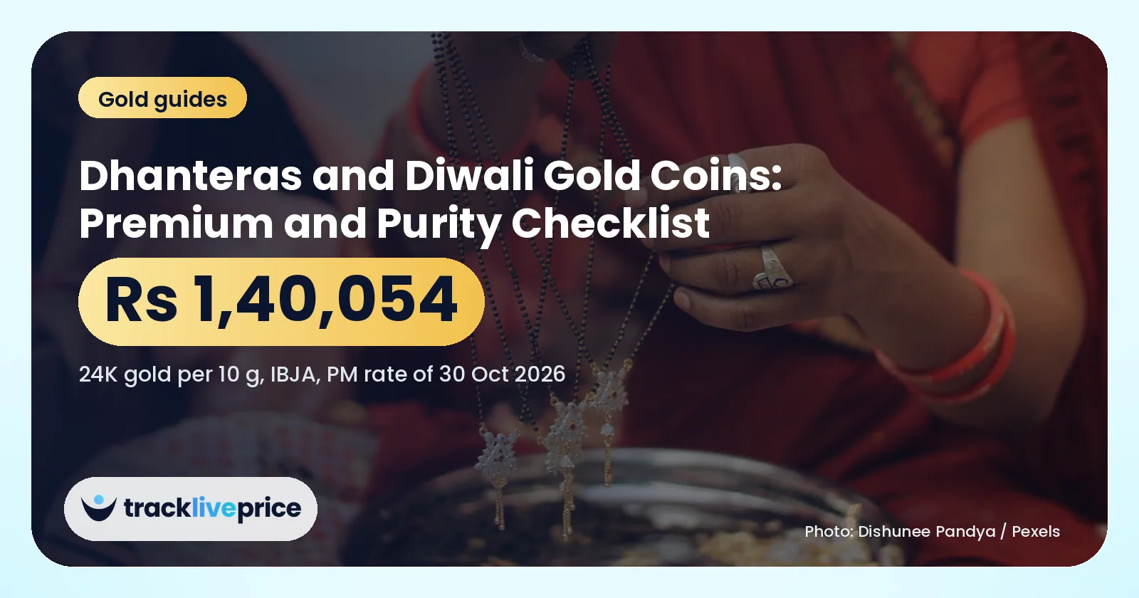 Gold jewellery and coins laid out on a counter in an Indian jeweller's shop